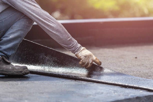 Professional Interior Drainage System technician working in Waretown, NJ